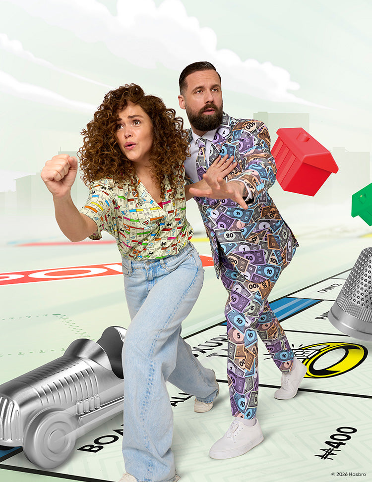 Image of a man and a woman running on a Monopoly board wearing Monopoly outfits.