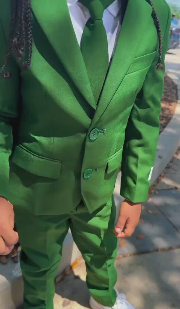 A short video showing a kid on the street wearing the Glorious Green Suit from OppoSuits.
