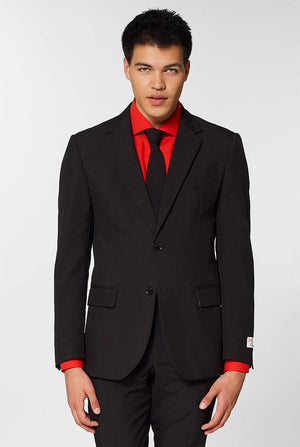Video of man wearing OppoSuits Black Knight black men's suit. Suit consist of blazer, pants and tie.