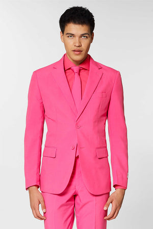 Video of man wearing Mr. Pink, pink men's suit, showing suit like a model. Suit consists of blazer, pant and tie.