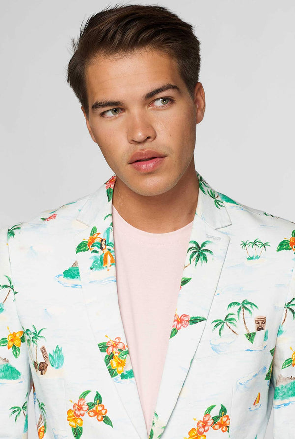 White casual blazer with Hawaiian icon print worn by man showing red palm tree inner lining