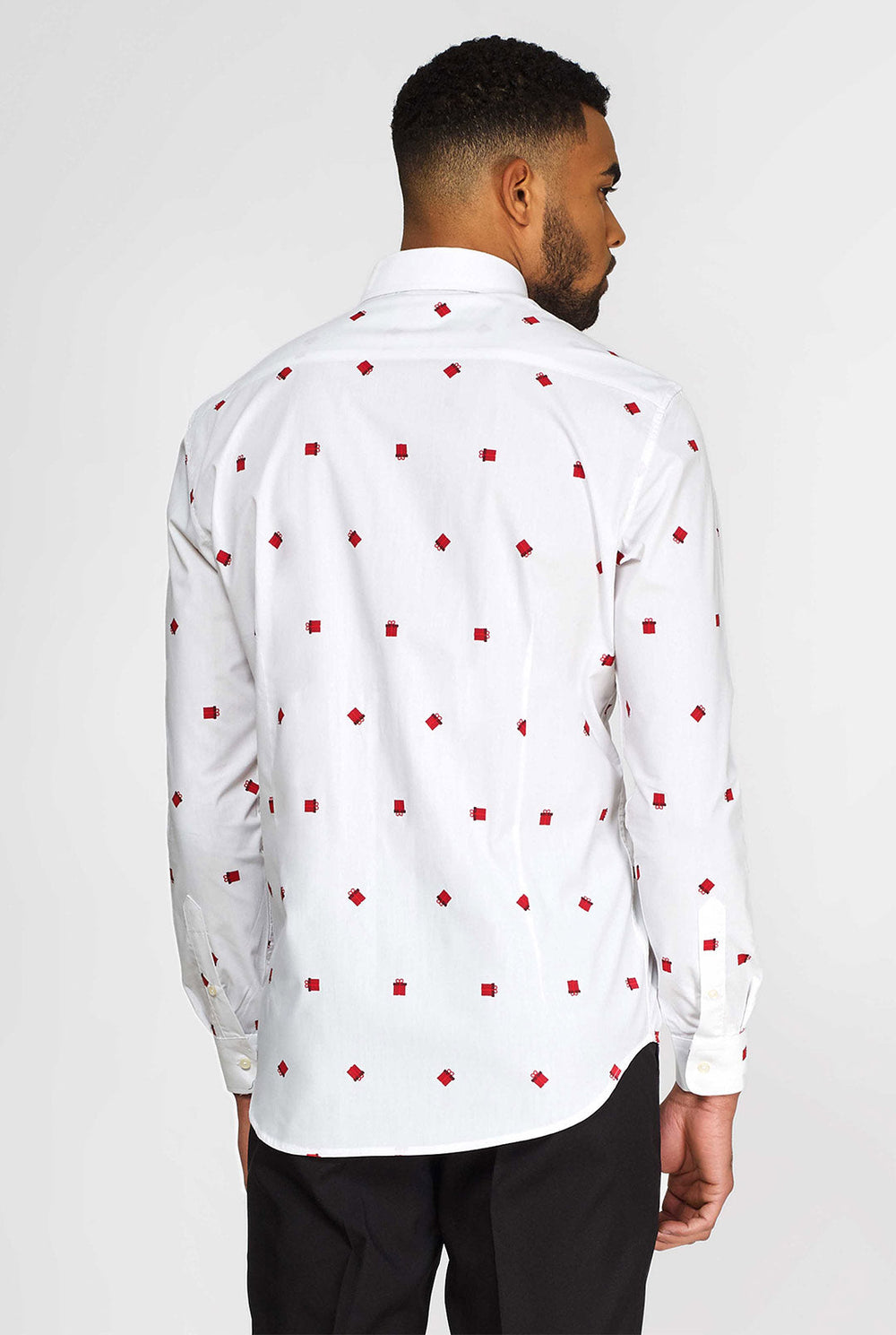 Man wearing white dress shirt with Christmas gift icons