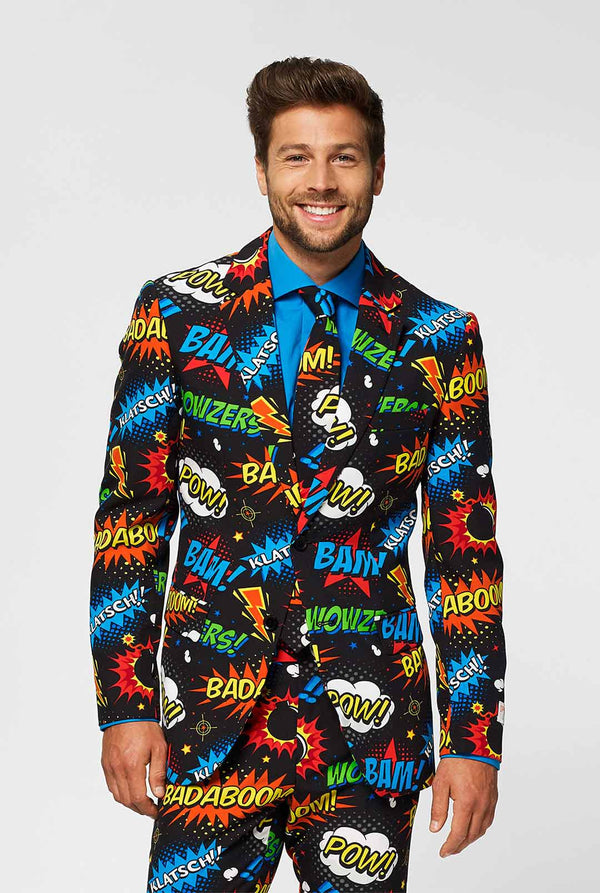 Black men's suit with comic book icons print worn by man