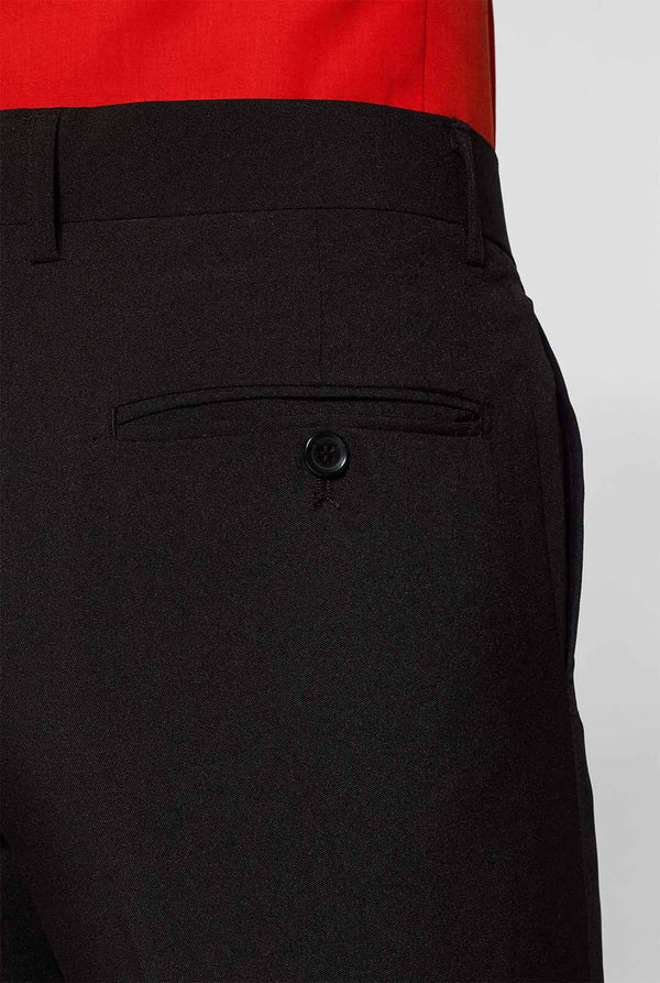 All black men's suit worn by man