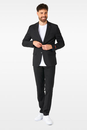 Man wearing casual black business suit