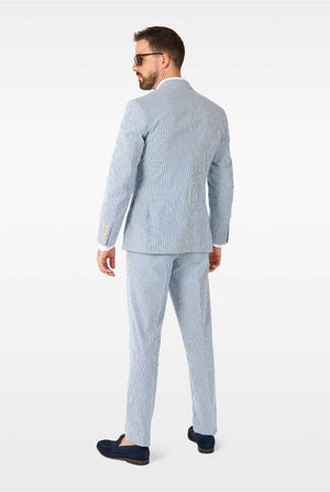 Man wearing stripped blue and white seer sucker suit