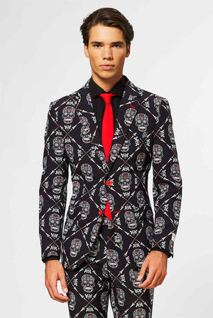 Man wearing black Halloween suit with skull print