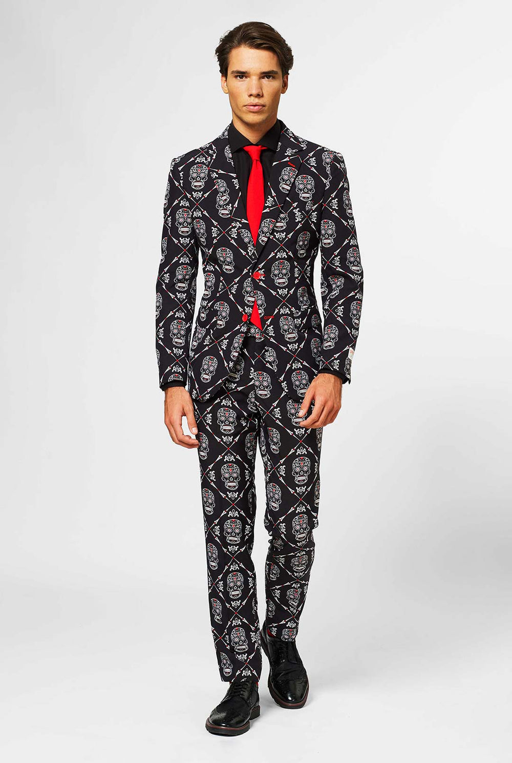 Man wearing black Halloween suit with skull print