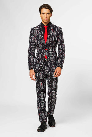 Man wearing black Halloween suit with skull print