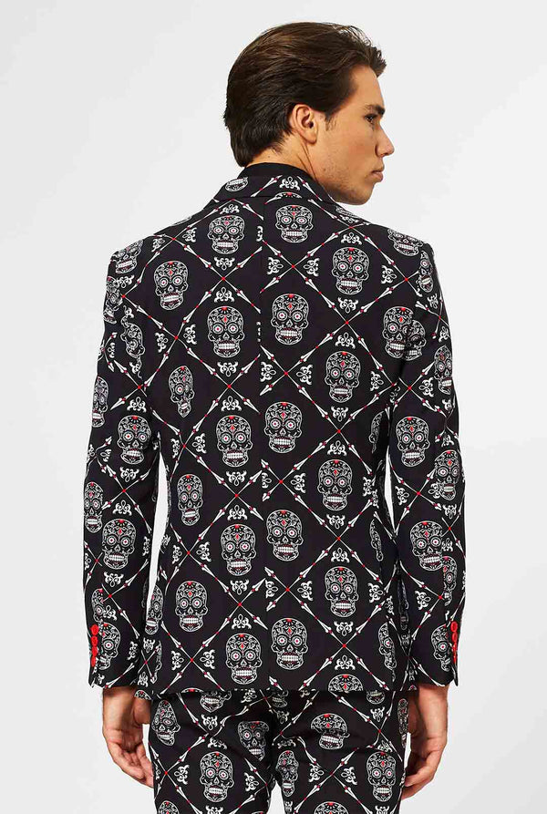 Man wearing black Halloween suit with skull print