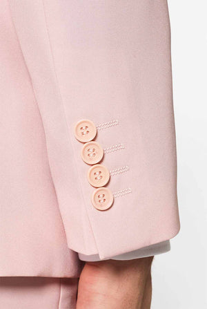 Man wearing pastel pink colored men's suit