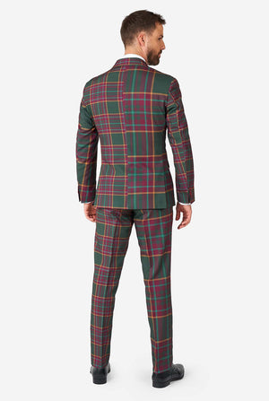 Man wearing a tartan plaid Christmas suit