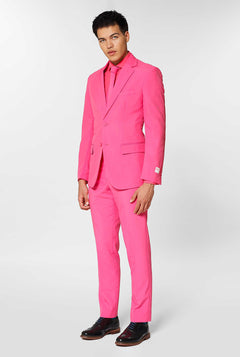 Man wearing pink men's suit with pink dress shirt