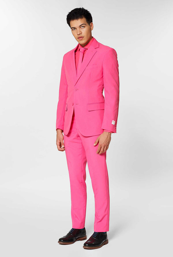 Man wearing pink men's suit with pink dress shirt