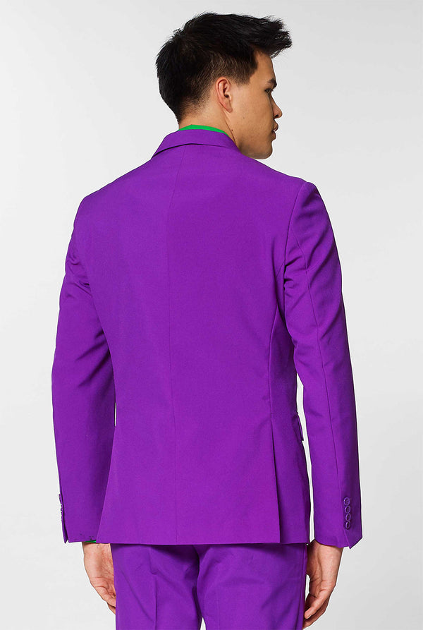 Man wearing purple men's suit and green dress shirt