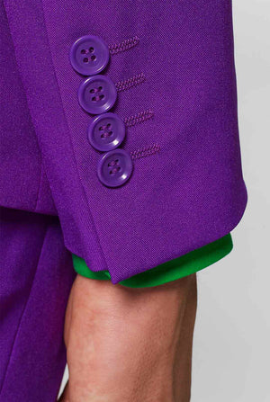 Man wearing purple men's suit and green dress shirt