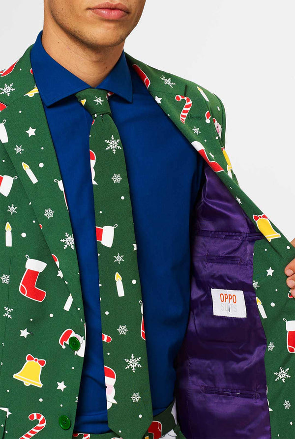 Man wearing green Christmas suit and blue dress shirt