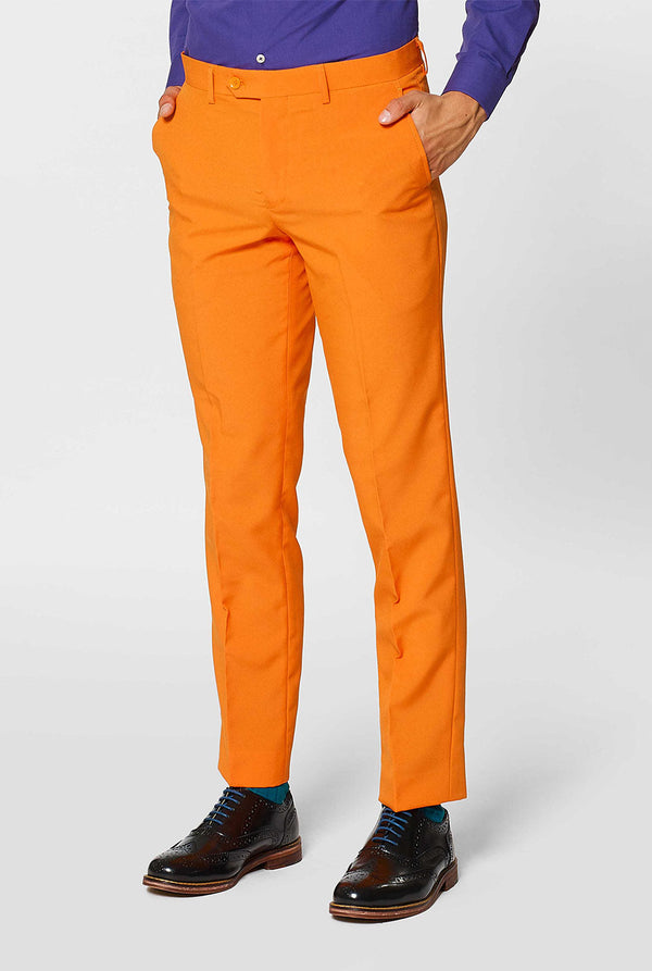 Man wearing orange men's suit with purple dress shirt