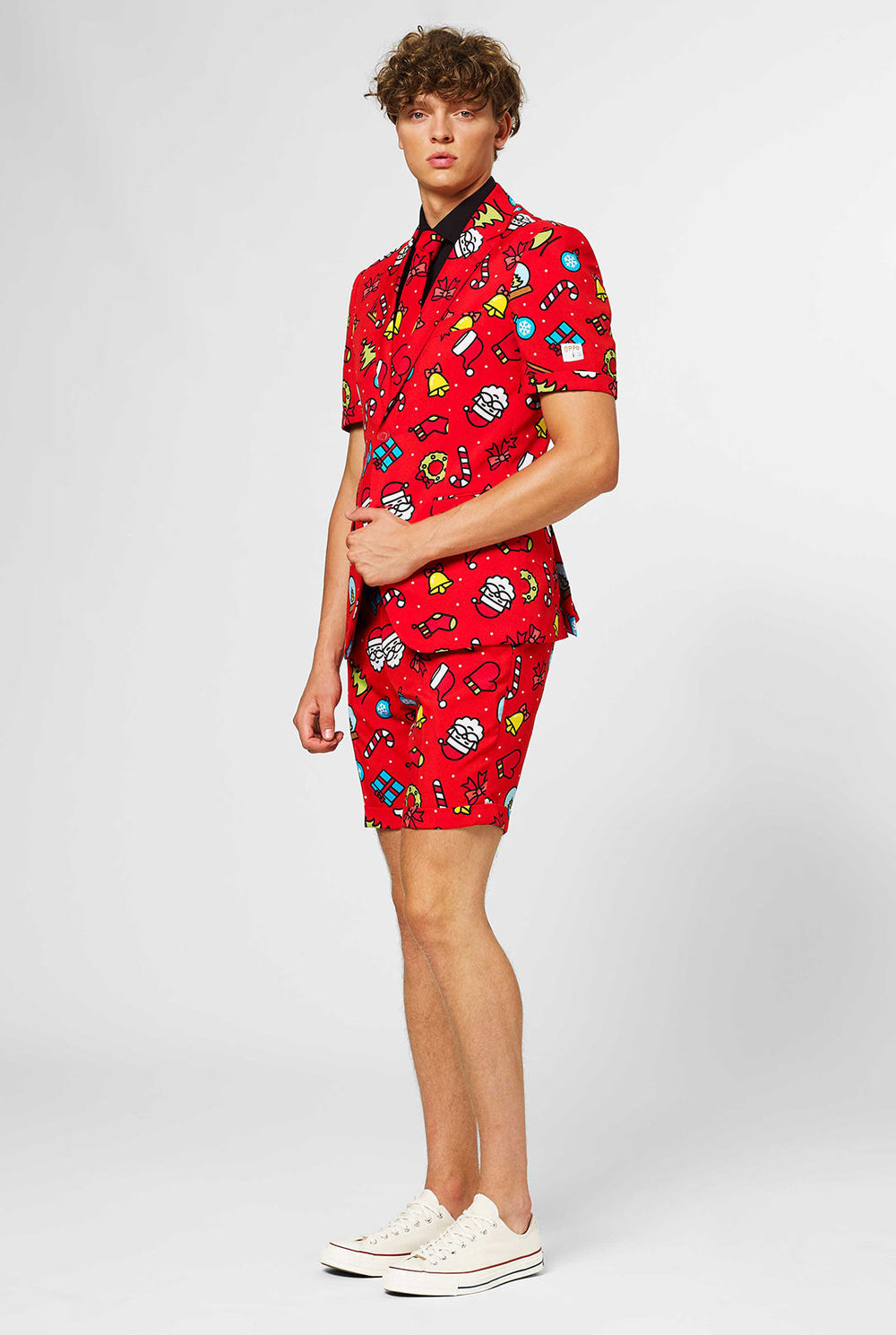 Man wearing red Christmas summer suit with Christmas print