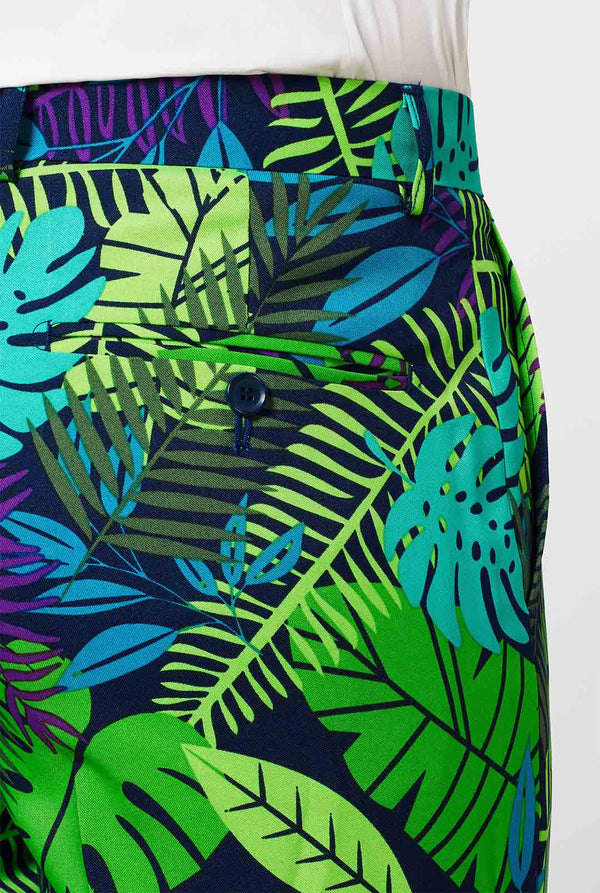 Man wearing green summer suit with jungle leaf print