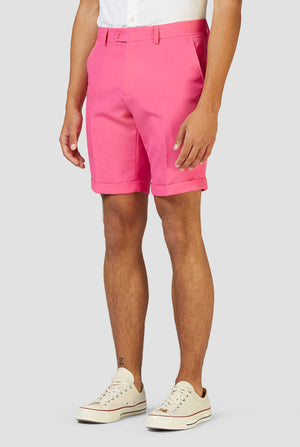 Man wearing pink summer suit