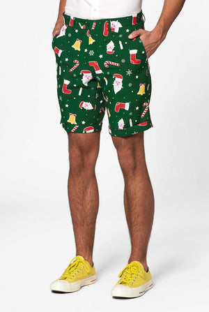 Man wearing green Christmas summer suit, consisting of shorts, jacket and tie