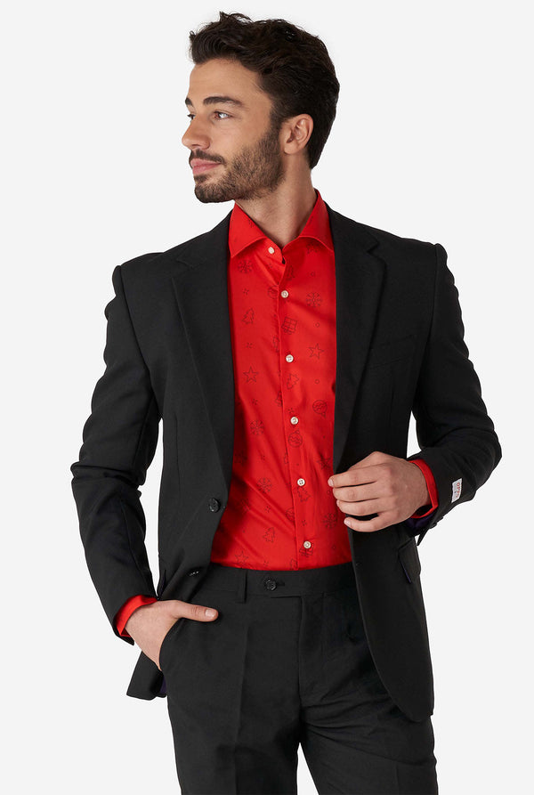 Man wearing red dress shirt with Christmas icons and black sport coat
