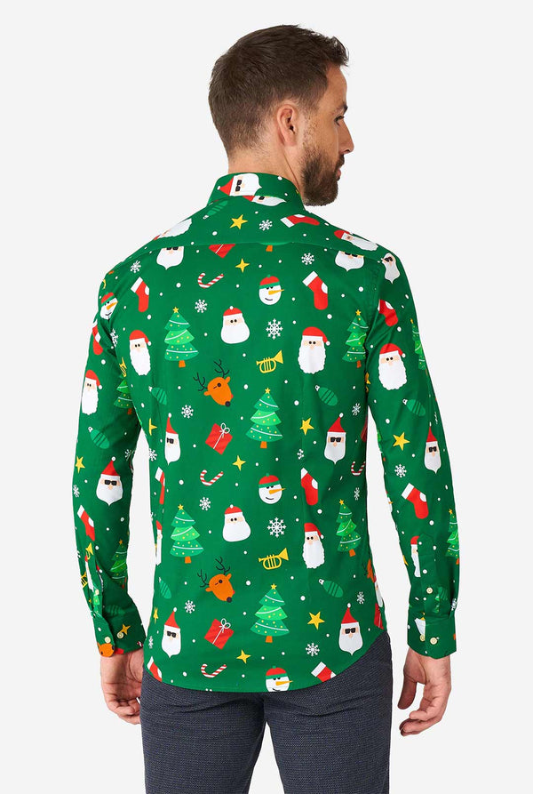 Man wearing green Christmas dress shirt with Christmas icons