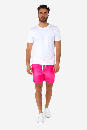 Man wearing colorful summer shorts and shirt