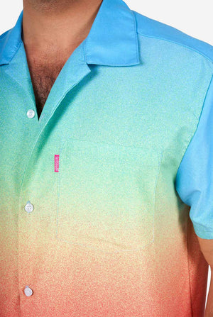 Man wearing colorful summer shorts and shirt