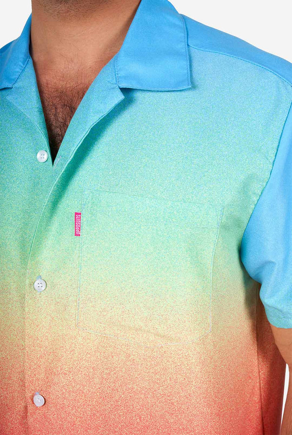 Man wearing colorful summer shorts and shirt