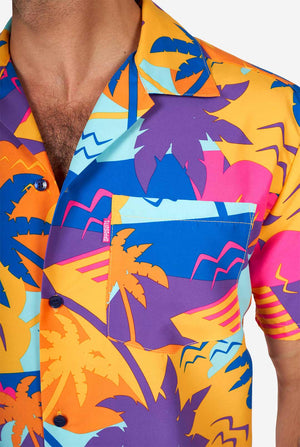 Man wearing colorful summer shorts and shirt