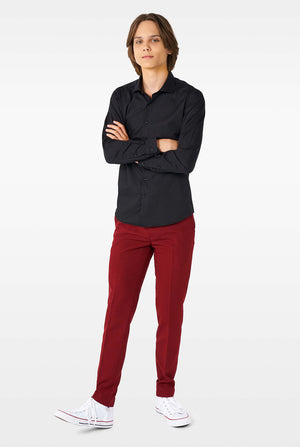 Teen wearing black dress shirt