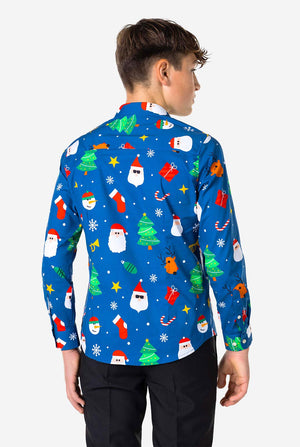 Teen wearing blue dress shirt with Christmas print