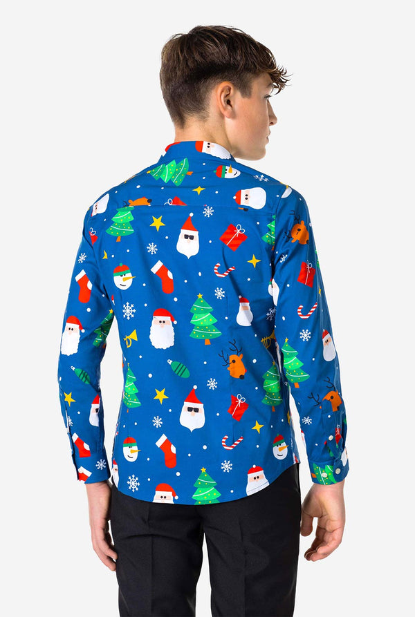 Teen wearing blue dress shirt with Christmas print