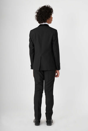 Teen wearing black tuxedo