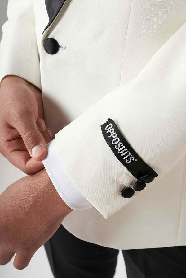 Teen wearing white and black tuxedo