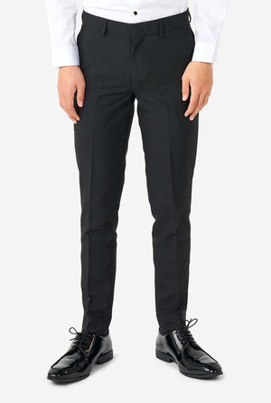 Teen wearing Burgundy red and black tuxedo, view of the pants