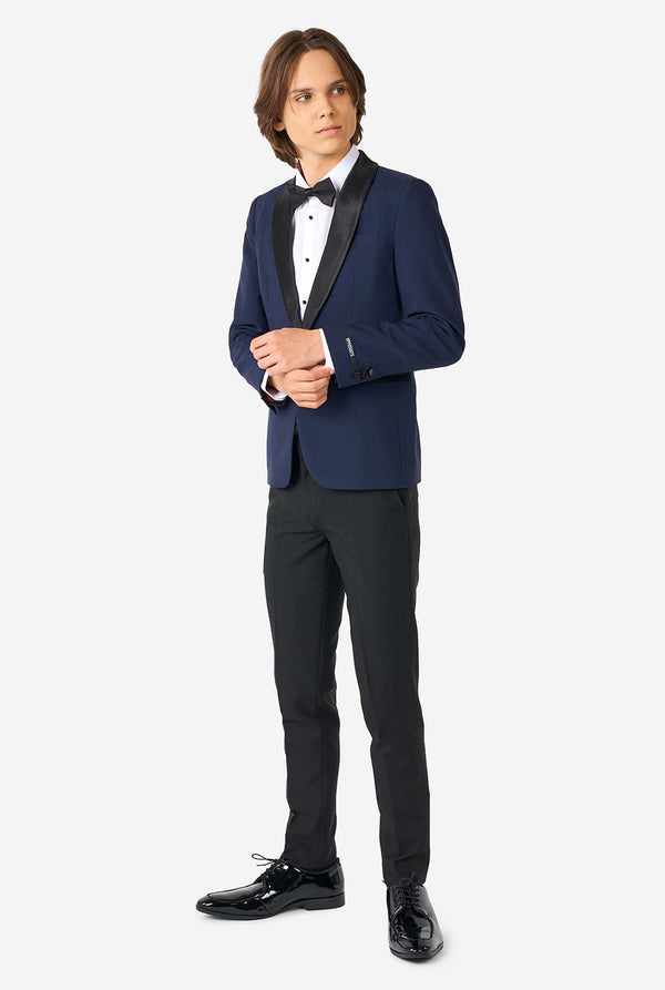 Teen wearing blue and black tuxedo