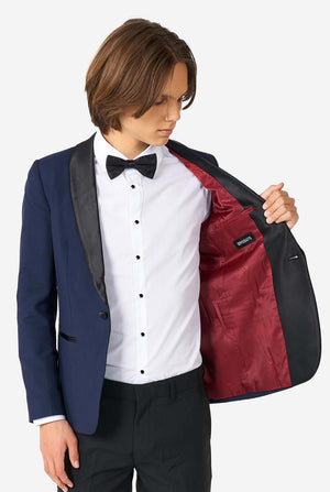 Teen wearing blue and black tuxedo