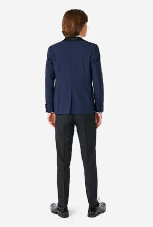 Teen wearing blue and black tuxedo