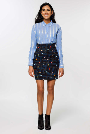 Woman wearing black dress suit with Pac-Man print